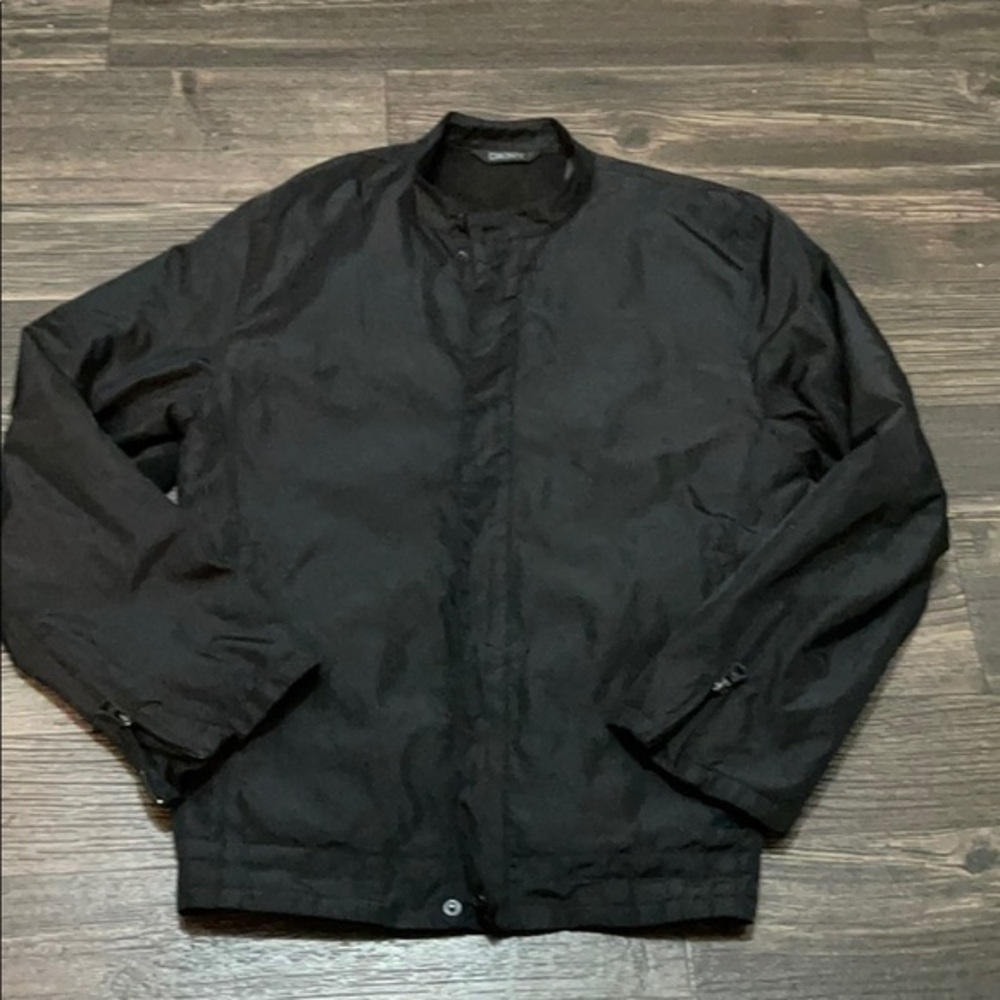 DKNY jacket weather proof with warm lining kinda puffy black colorway dressy